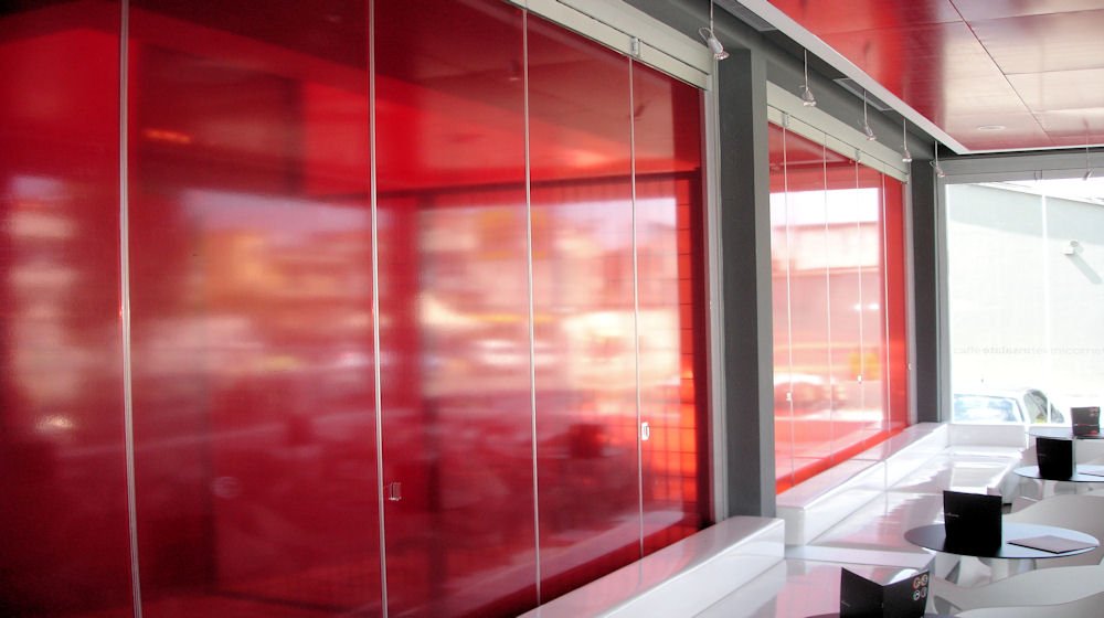 Bi-folding decorated glass door 